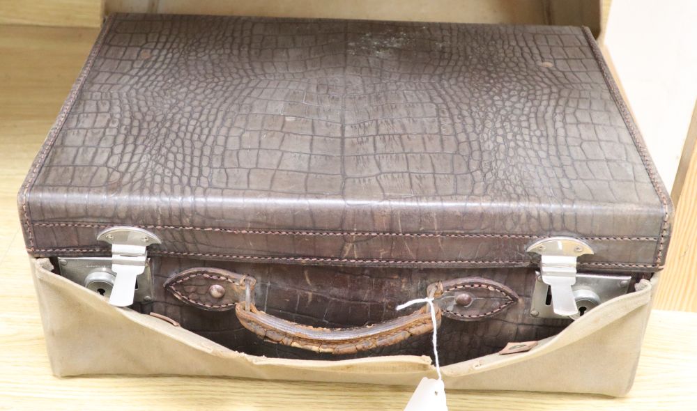 A faux crocodile suitcase and cover, width 45cm depth 30cm height 18cm